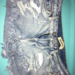 blue spice destressed jean shorts